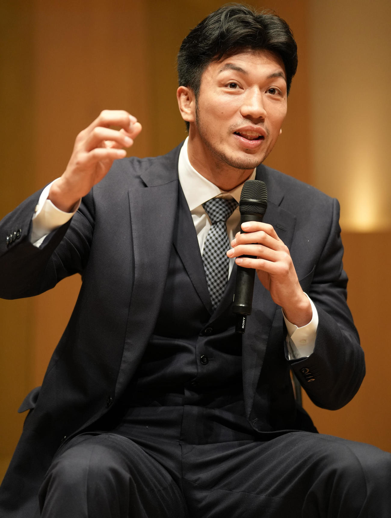 第13回日本スポーツ学会大賞を受賞し、講演で話す村田（撮影・鈴木みどり）