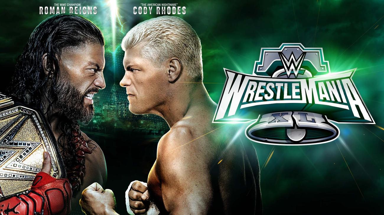4月のレッスルマニア40大会で激突するWWEヘビー級、ユニバーサル統一王者ローマン・レインズ（左）と挑戦者コーディ・ローデス（C）WWE