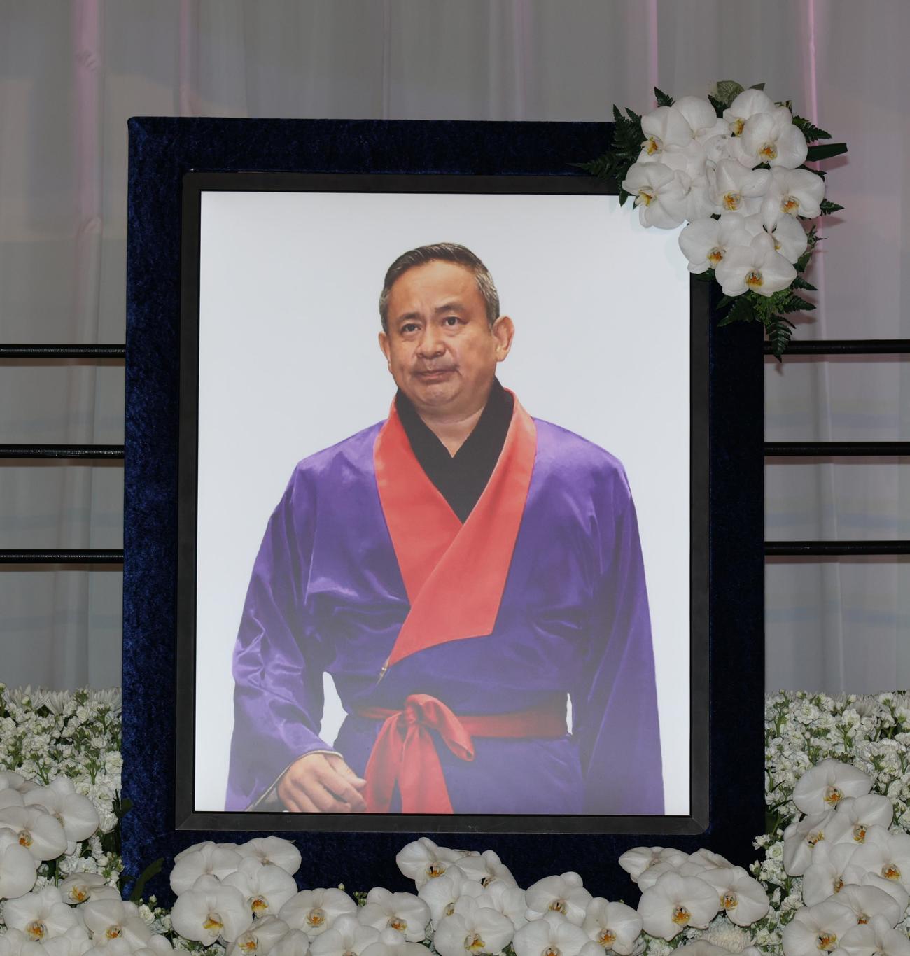 西村修氏の遺影（撮影・中島郁夫）