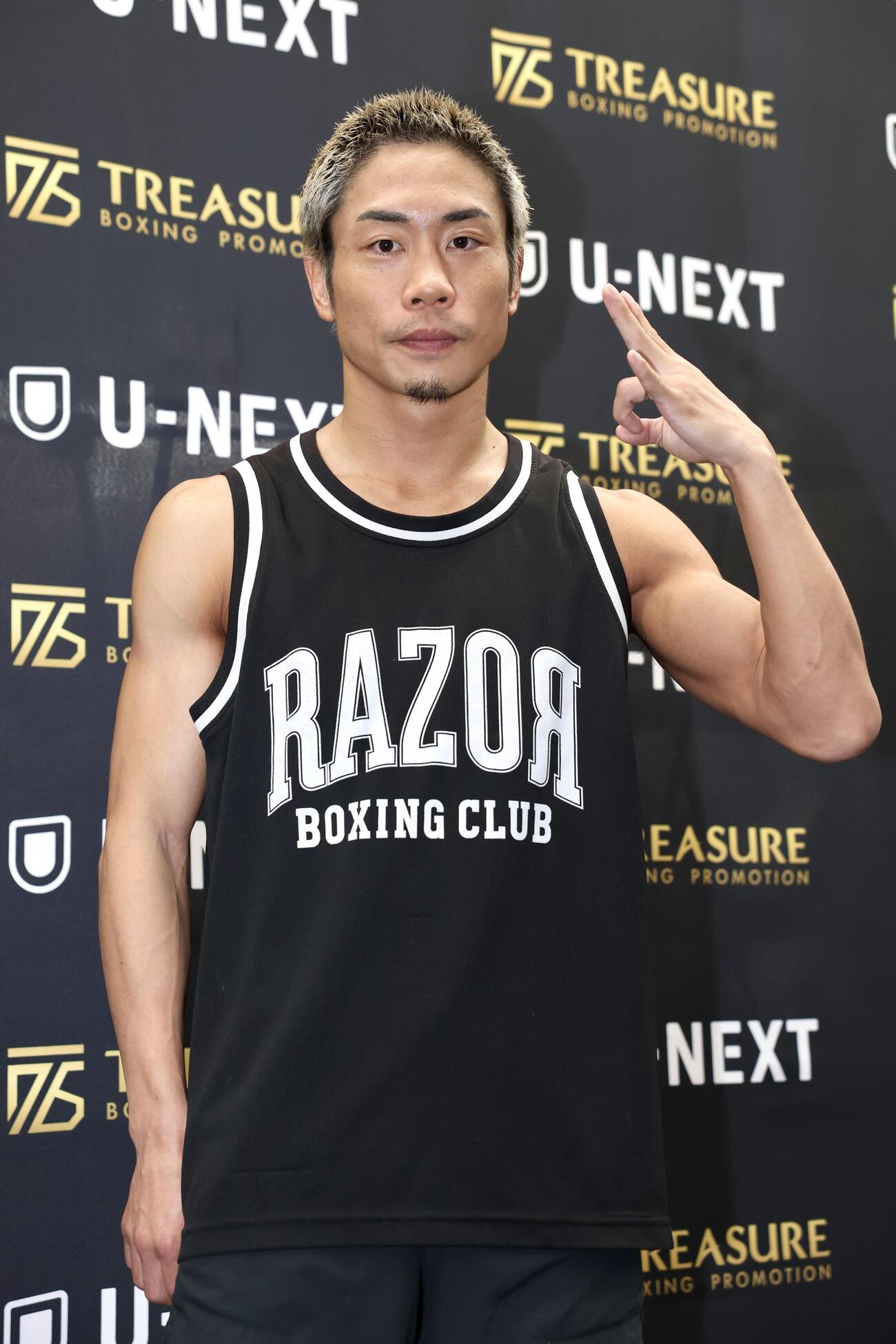 ポーズを決める谷口（撮影・宮地輝）