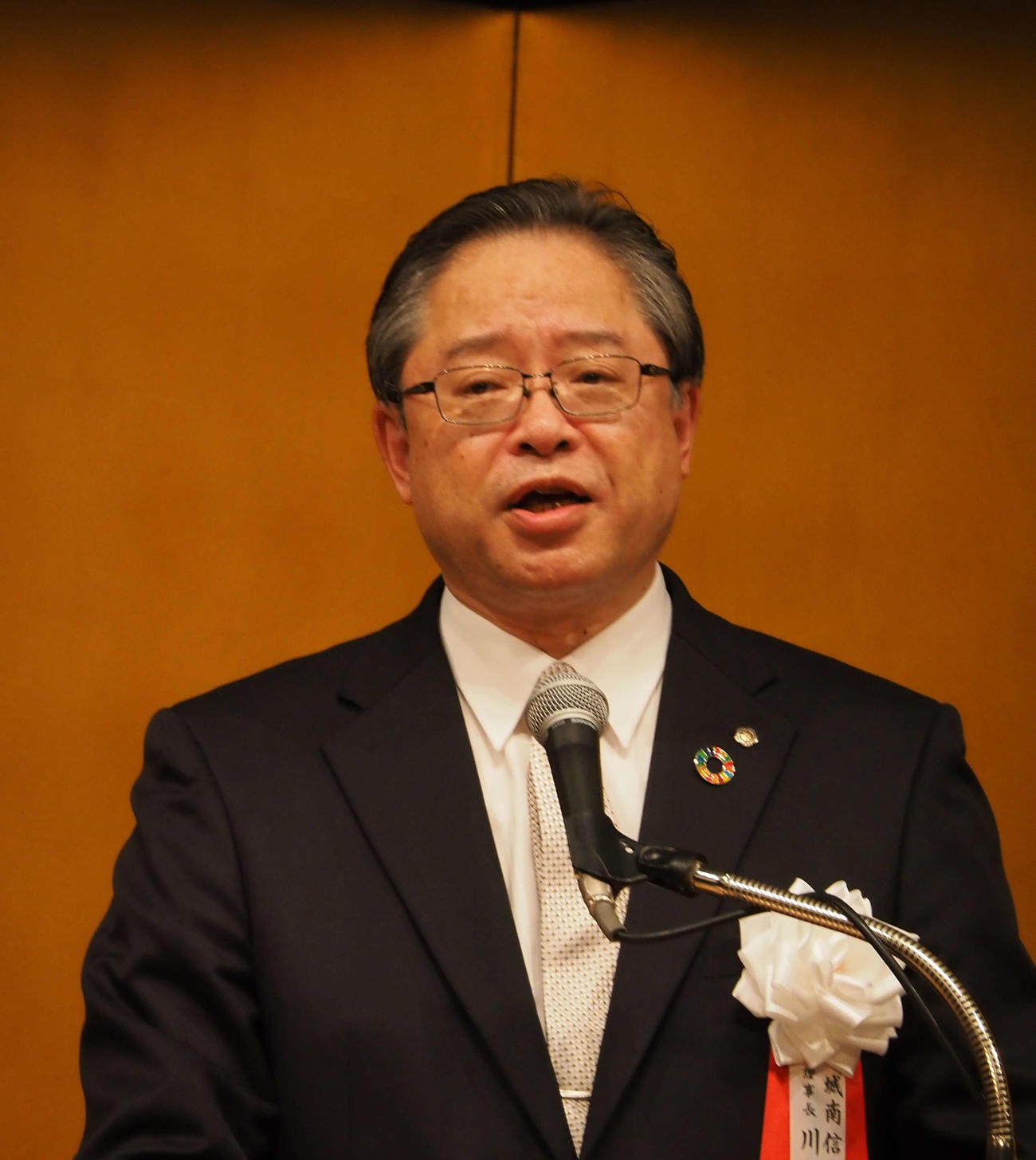 城南友の会であいさつする川本理事長