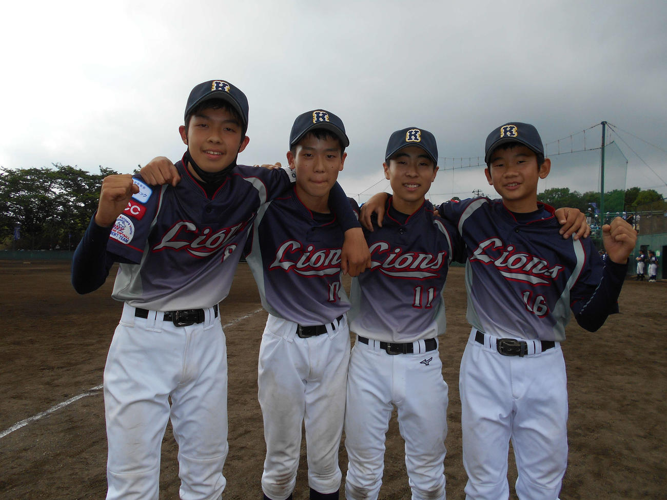 ベースランニング競走優勝の江東ポニージュニア。左から二宮遥、川田照也、佐々木璃空、薗田理功