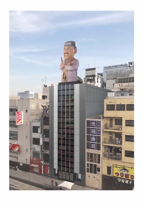 「だるま大臣像」を屋上に設置した新ビルの完成予想図（一門会提供）