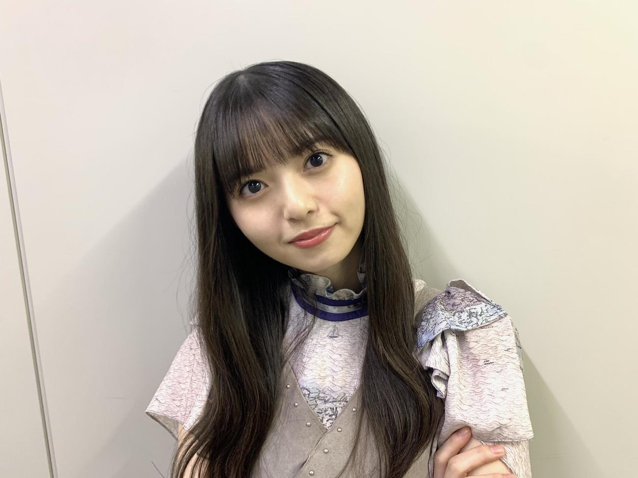 笑顔を見せる齋藤飛鳥