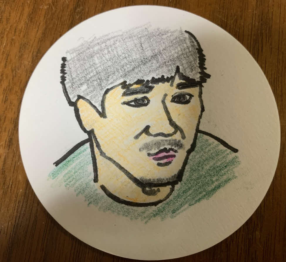 谷健二氏が描いたヤン・イクチュンの似顔絵