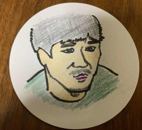 谷健二氏が描いたヤン・イクチュンの似顔絵