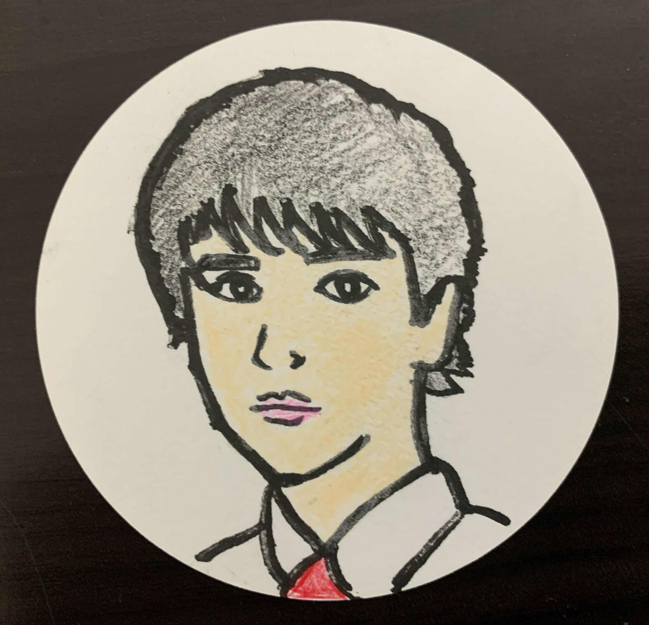 映画監督谷健二氏が描いた富樫慧士の似顔絵