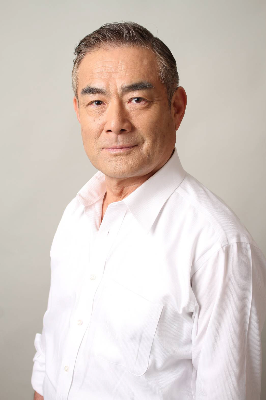 辻萬長さん