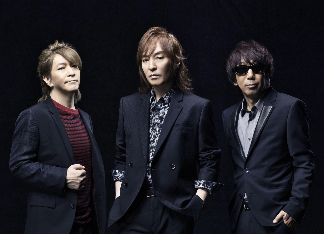 6年ぶりの“再起動”を発表したTM NETWORK。左から小室哲哉、宇都宮隆、木根尚登