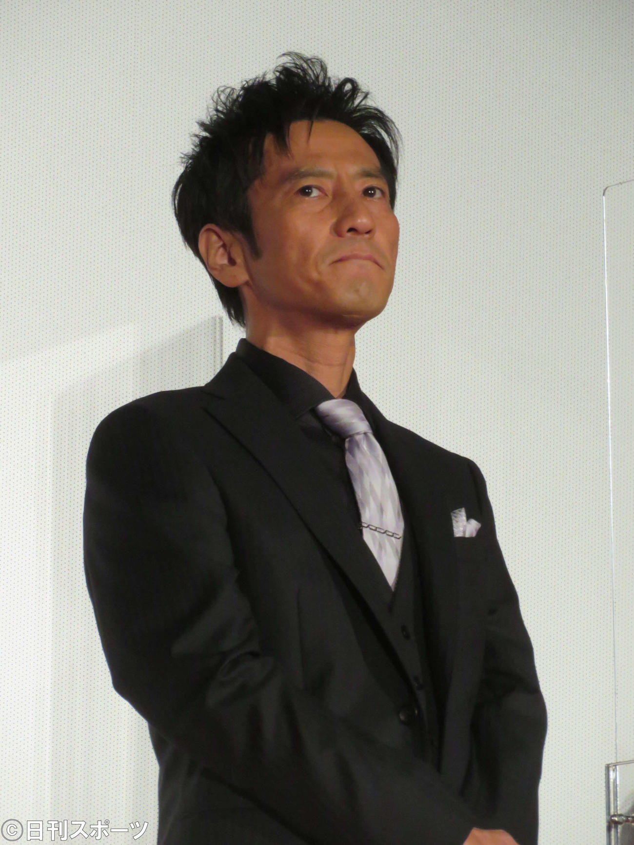 映画「ONODA　一万夜を超えて」初日舞台あいさつに登壇した津田寛治（撮影・村上幸将）
