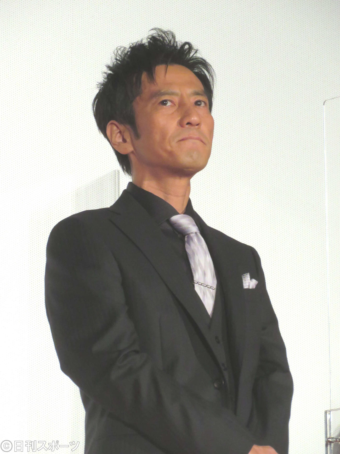 映画「ONODA　一万夜を超えて」初日舞台あいさつに登壇した津田寛治（撮影・村上幸将）