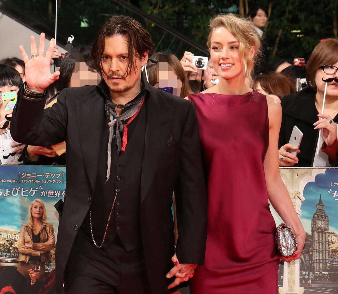 ジョニー・デップ（左）と元妻アンバー・ハード（2015年1月撮影）