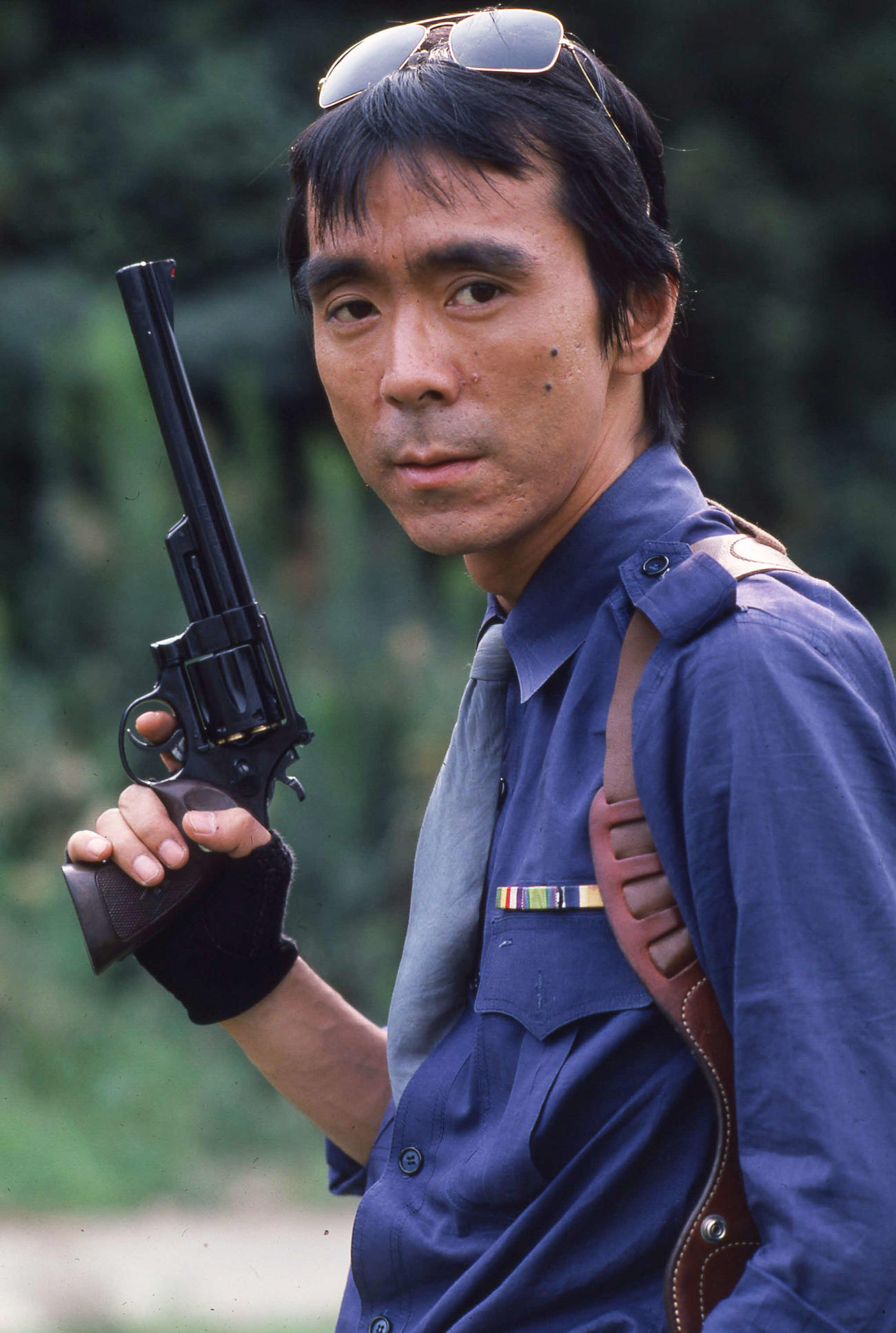 寺尾聰演じるリキこと松田猛刑事。「西部警察　PART1」57話より。愛用の銃はS＆W M29 44マグナム8－3／8インチ（C）青志社