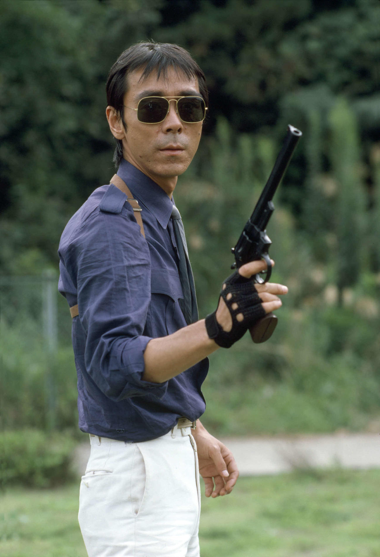 寺尾聰演じるリキこと松田猛刑事。「西部警察　PART1」57話より。愛用の銃はS＆W M29 44マグナム8－3／8インチ（C）青志社