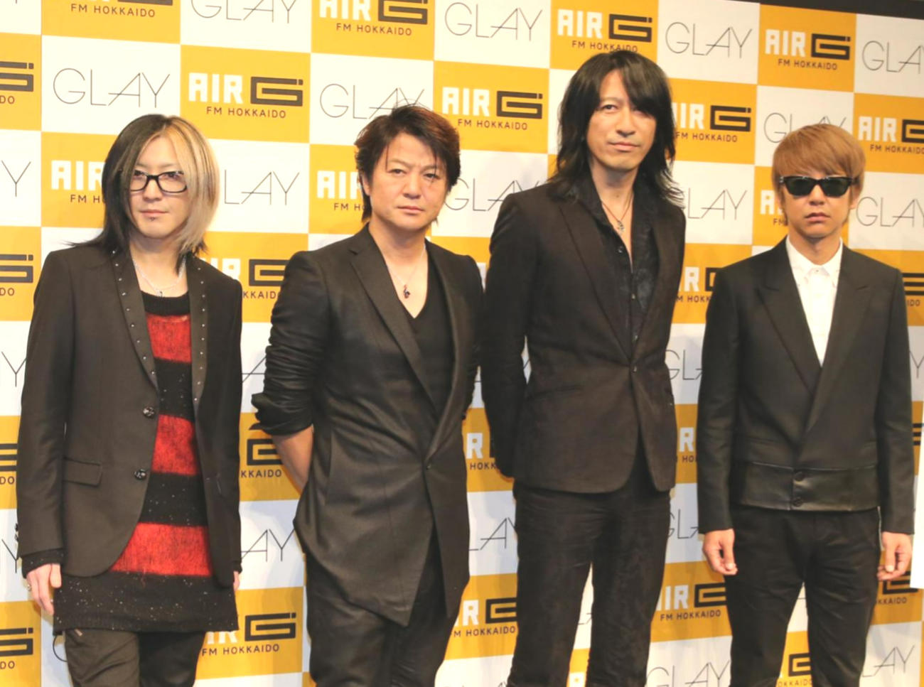 GLAYのメンバー。左からHISASHI、TERU、TAKURO、JIRO（2015年11月19日撮影）