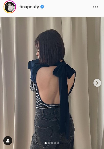 大胆に背中を見せる玉城ティナ