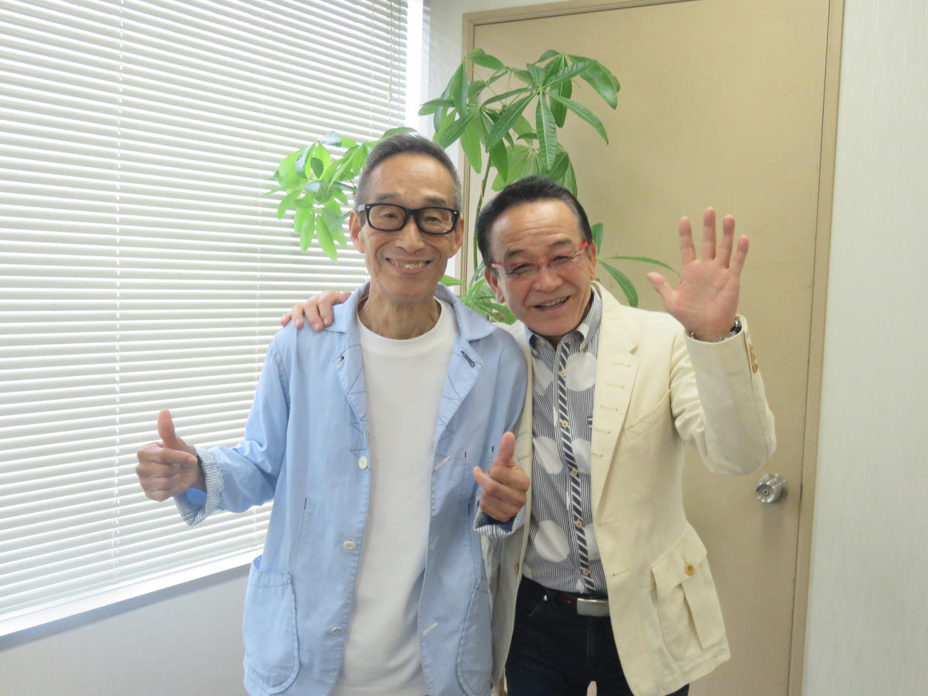 菅原進（左）と湯原昌幸