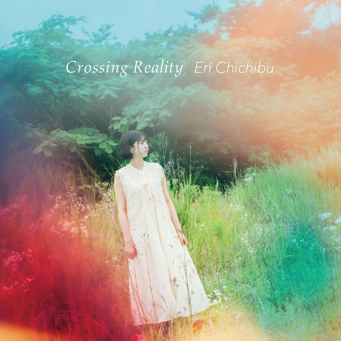 22年9月リリースのファーストアルバム「Crossing Reality］のCDジャケット
