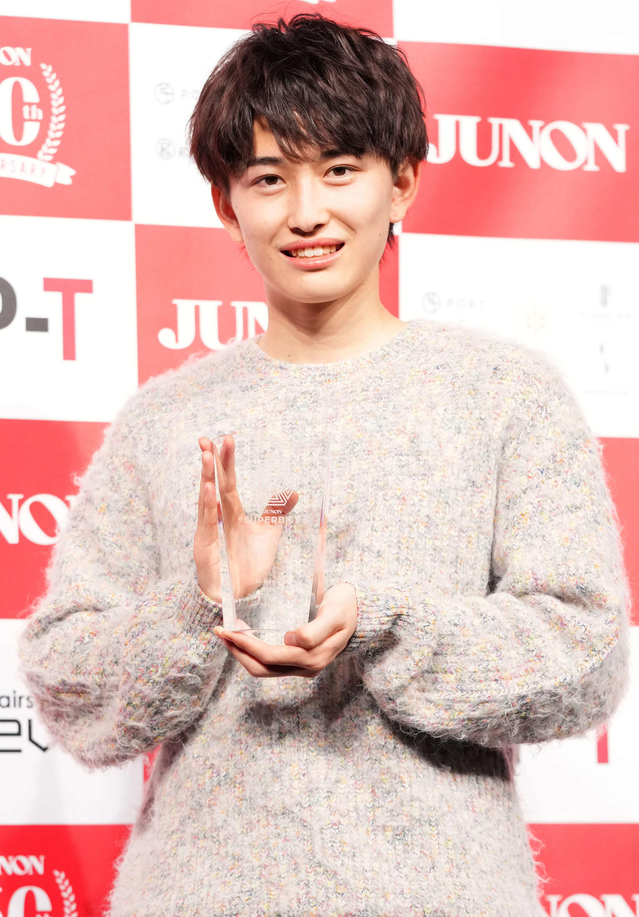 グランプリを受賞し笑顔を見せる石山順征さん（撮影・横山健太）