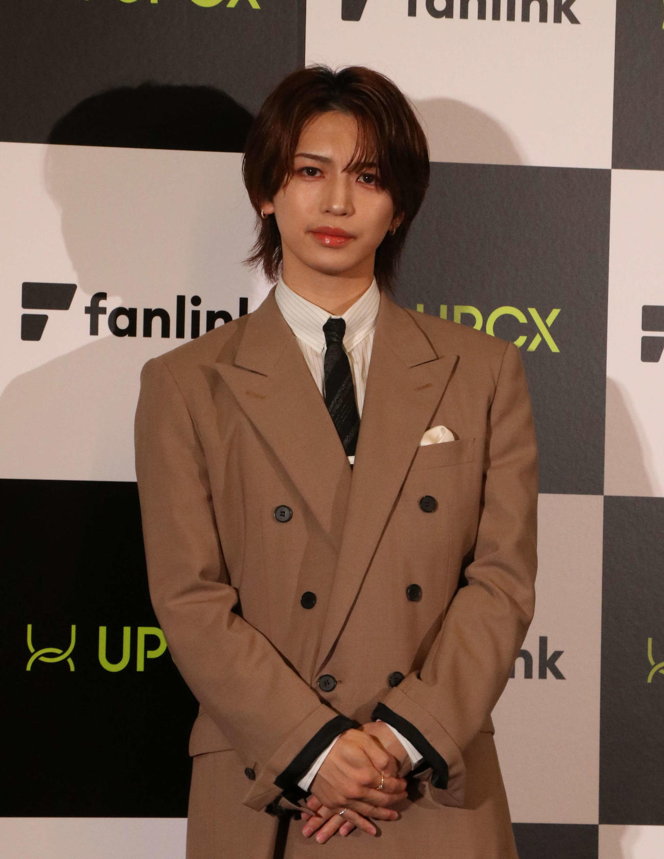 UPCXの記者会見に登壇する岩橋玄樹（撮影・寺本吏輝）