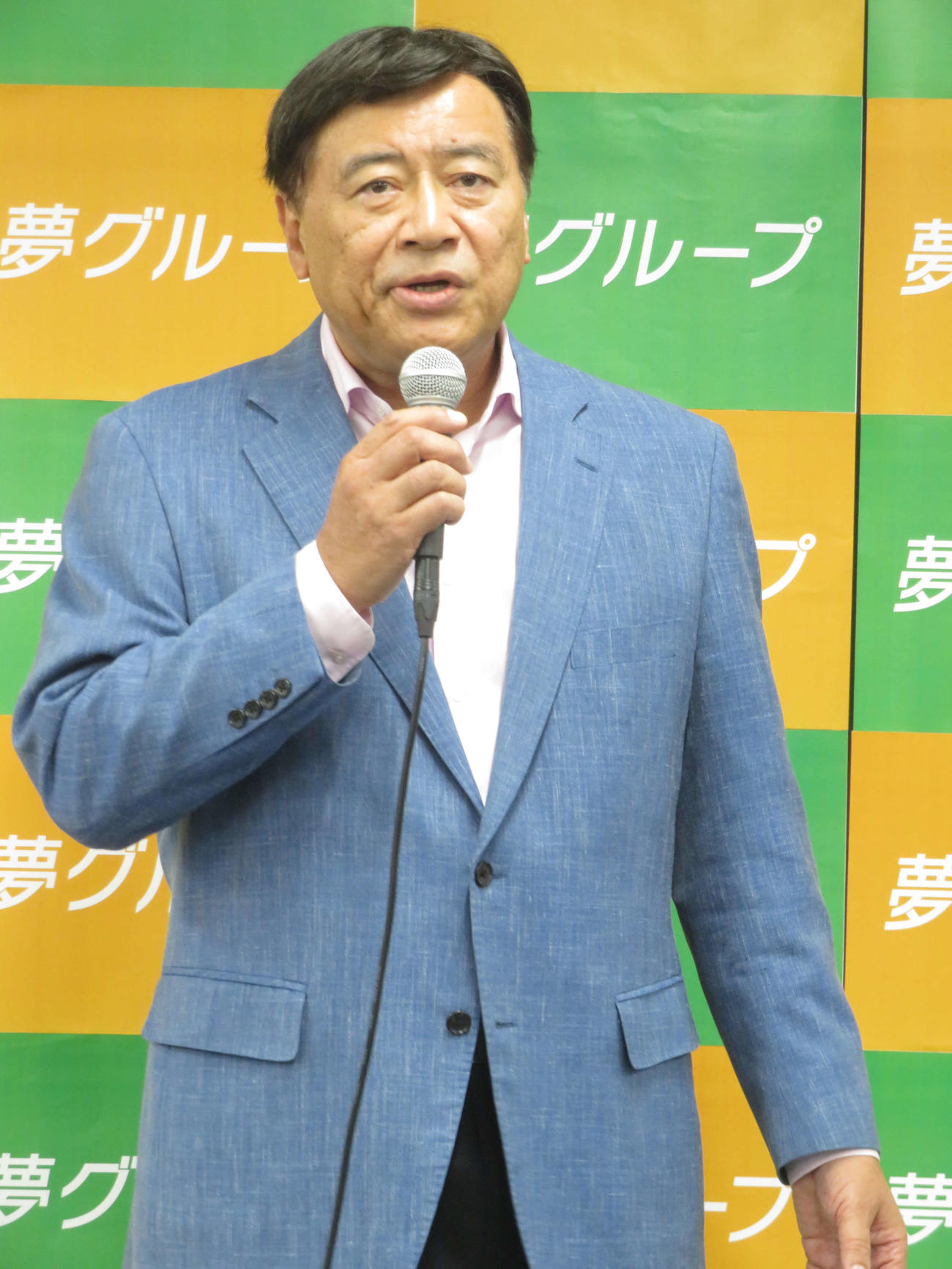 会見を行った「夢グループ」石田重広社長