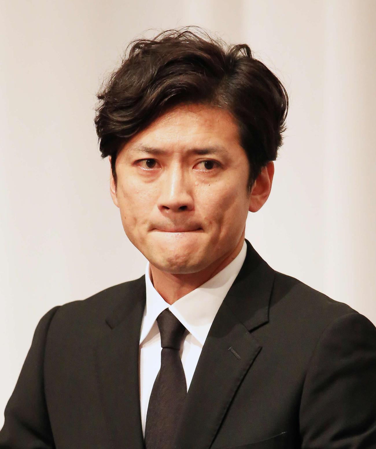 唇を噛みしめるTOKIO国分太一（18年5月撮影）