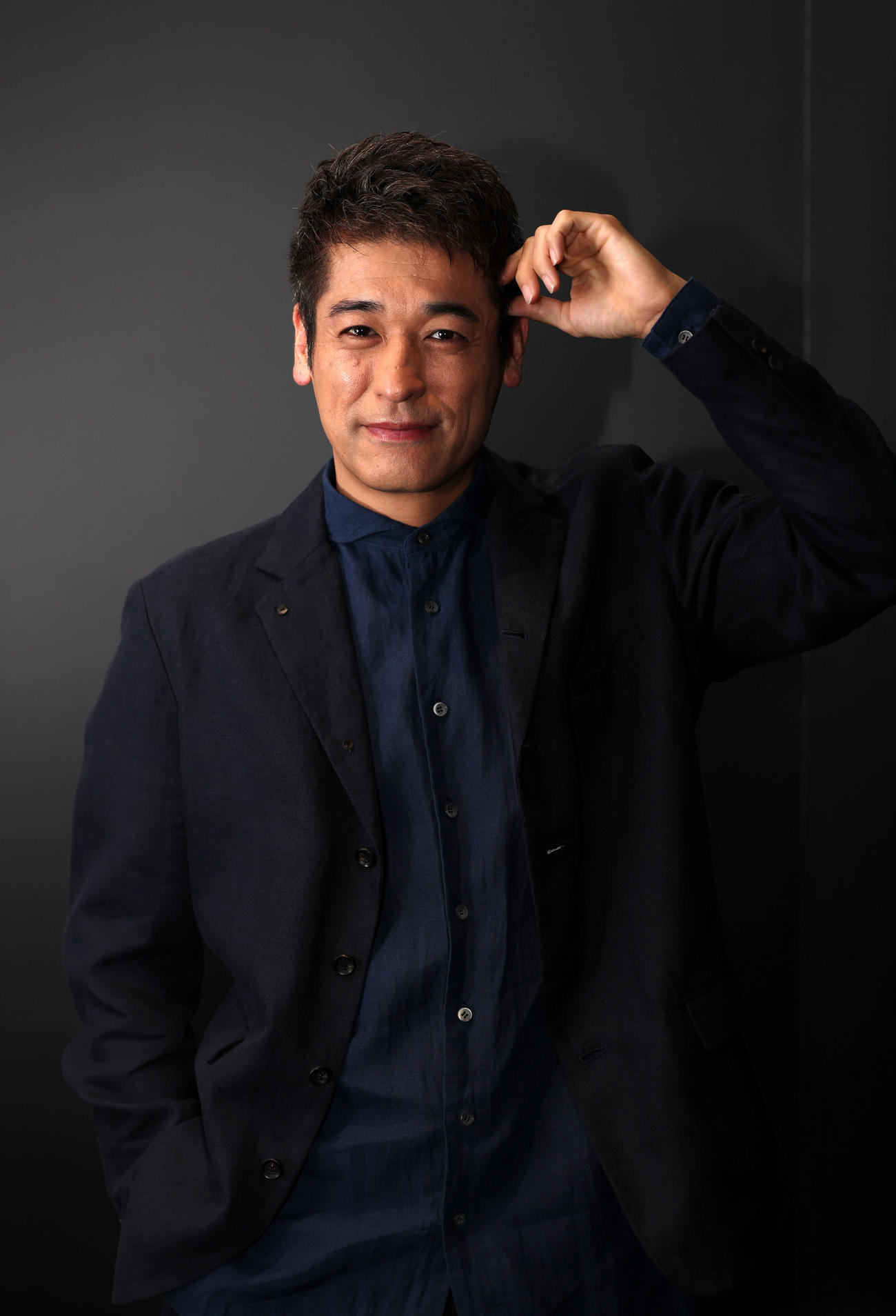 柔らかな表情を見せる佐藤隆太（撮影・浅見桂子）