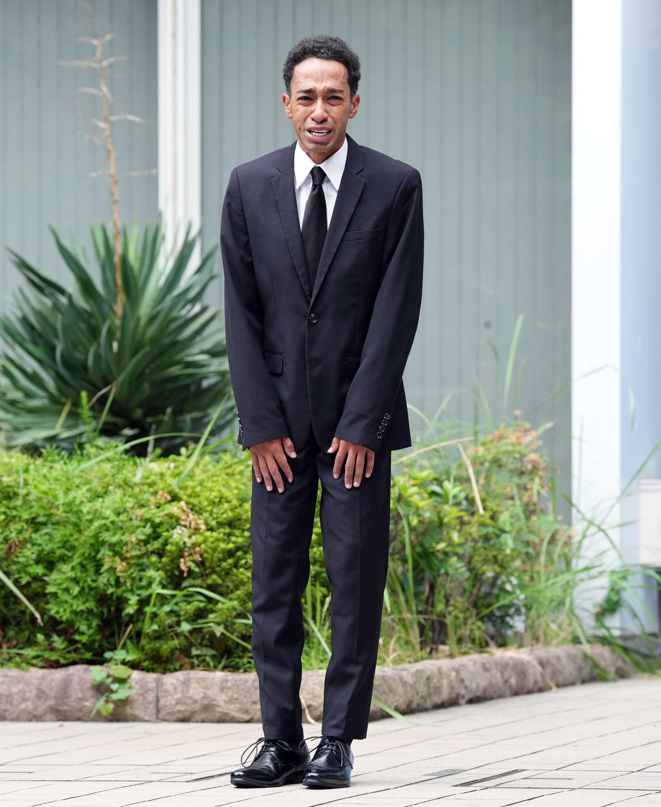 謝罪の言葉を述べ目に涙を浮かべるAえ！group草間リチャード敬太容疑者（撮影・小島史椰）