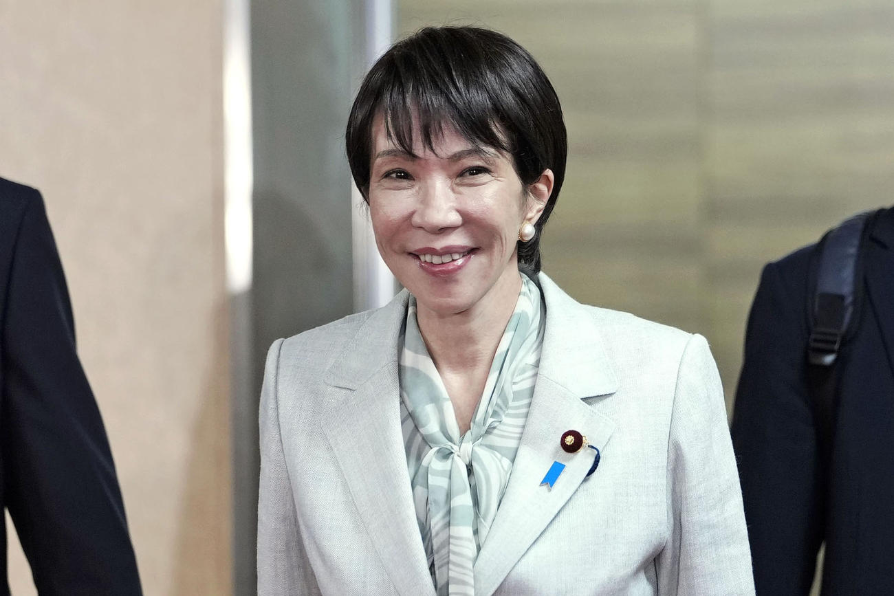 自民党本部に入る高市早苗総裁（共同）