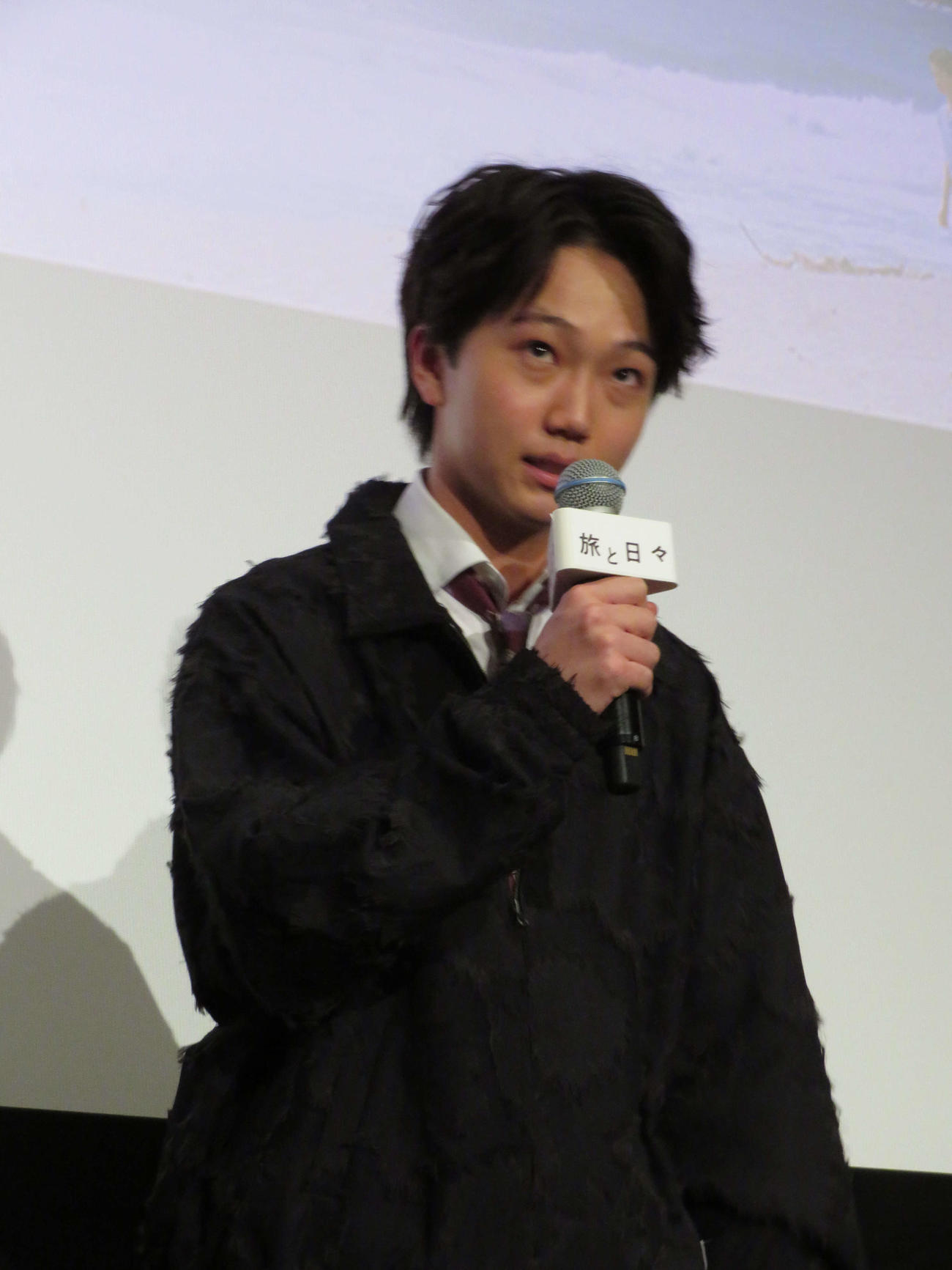 映画「旅と日々」前夜祭舞台あいさつに登壇した髙田万作（撮影・村上幸将）