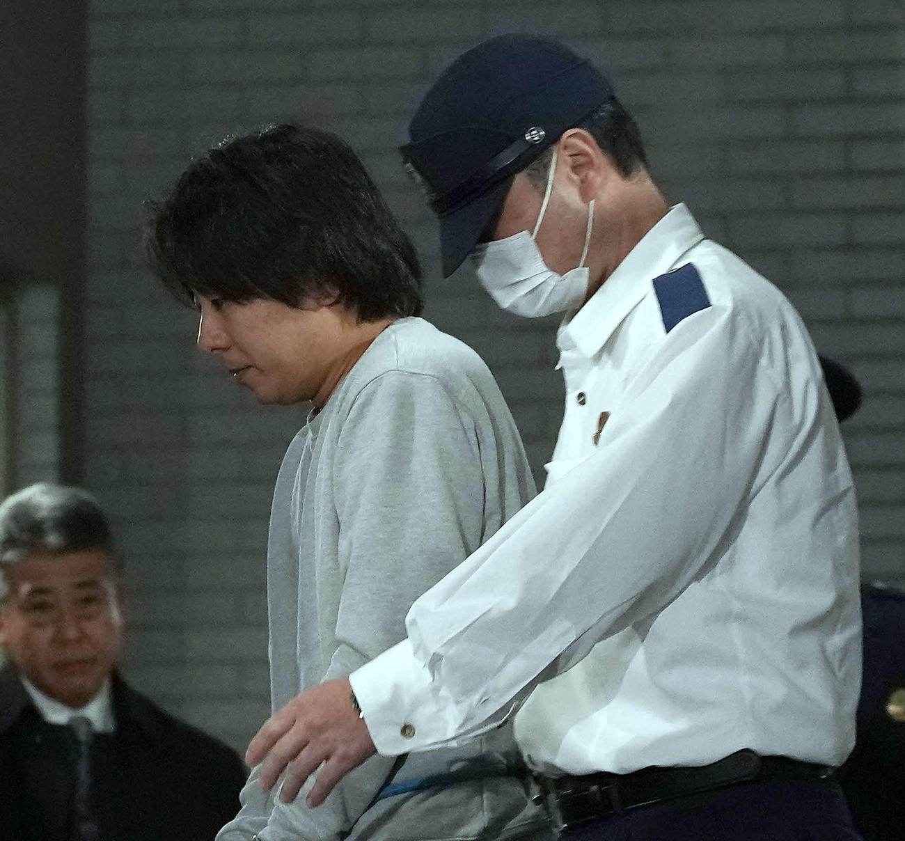 蔵前署に移送された中村鶴松容疑者（撮影・たえ見朱実）