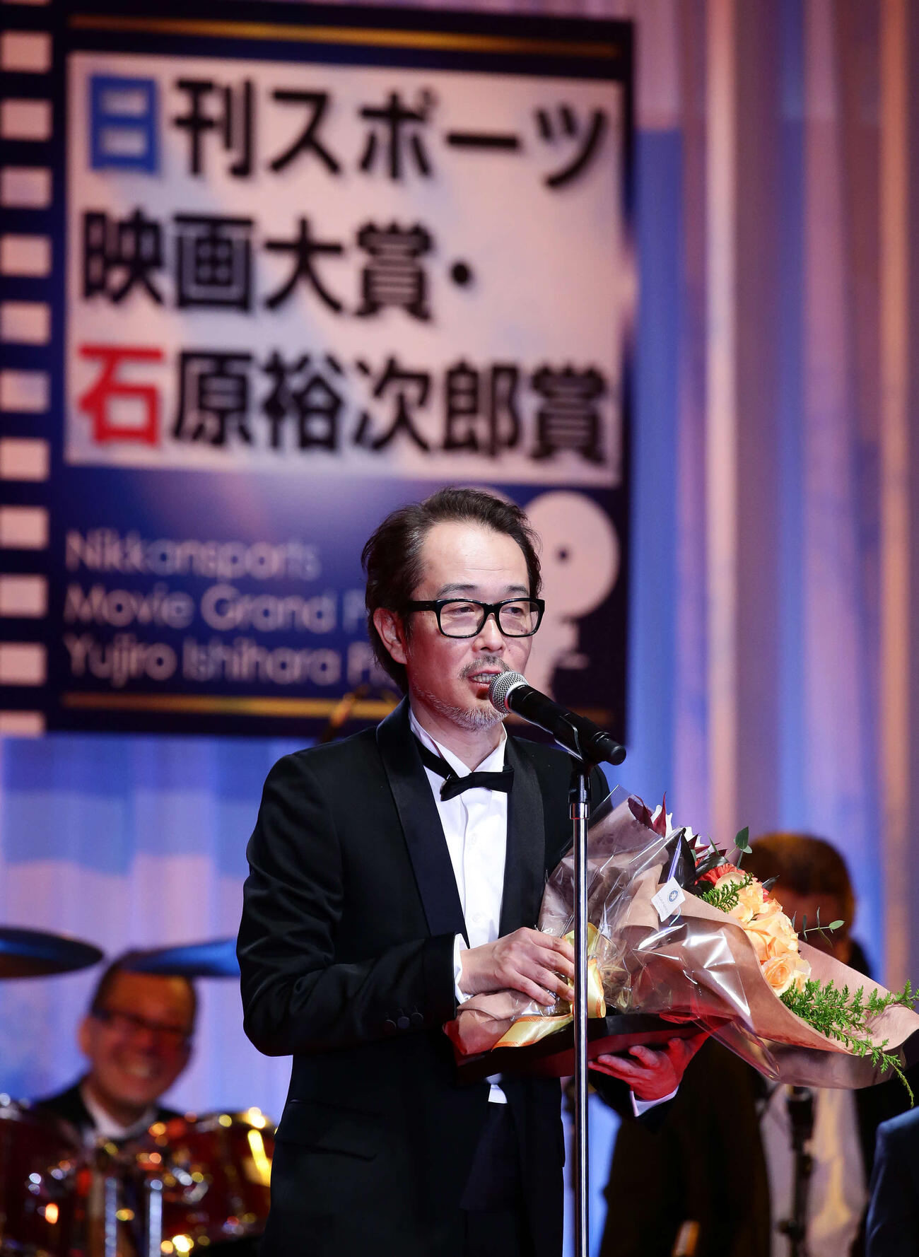 第26回日刊スポーツ映画大賞・石原裕次郎賞授賞式　助演男優賞を受賞し喜びを語るリリー・フランキー（2013年12月撮影）