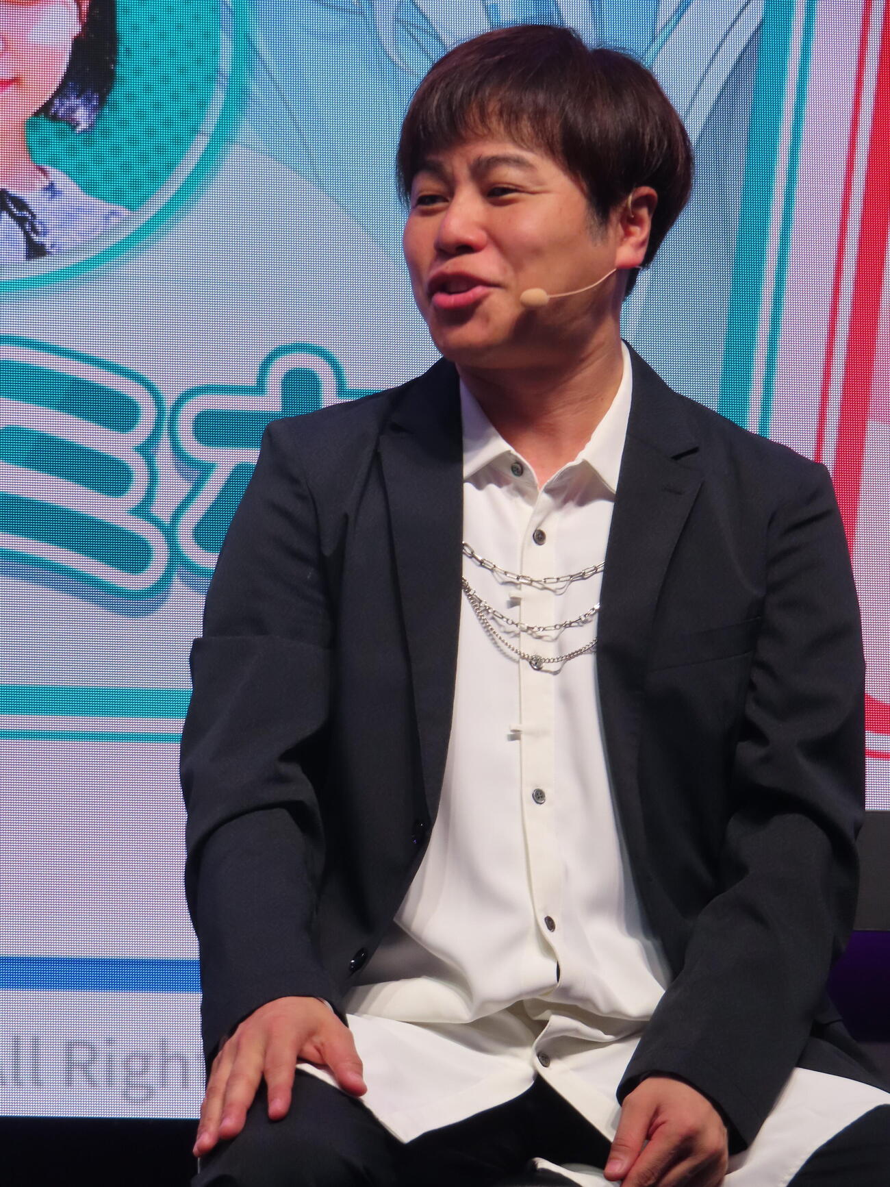 東京ゲームショウ2026のネットマーブルブースに登壇した井上裕介（撮影・鎌田良美）