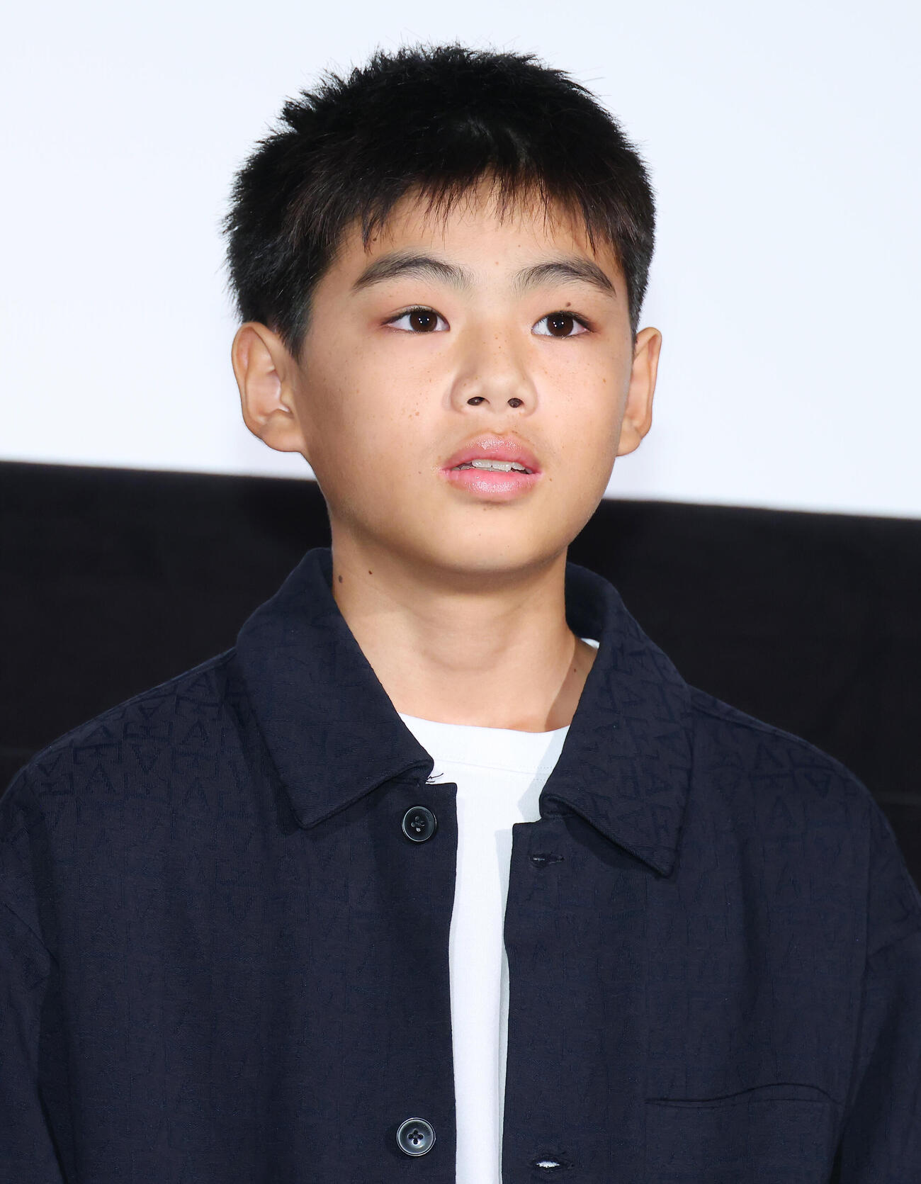 映画「わたしの知らない子どもたち」初日舞台あいさつを行う羽山由一郎（撮影・中島郁夫）