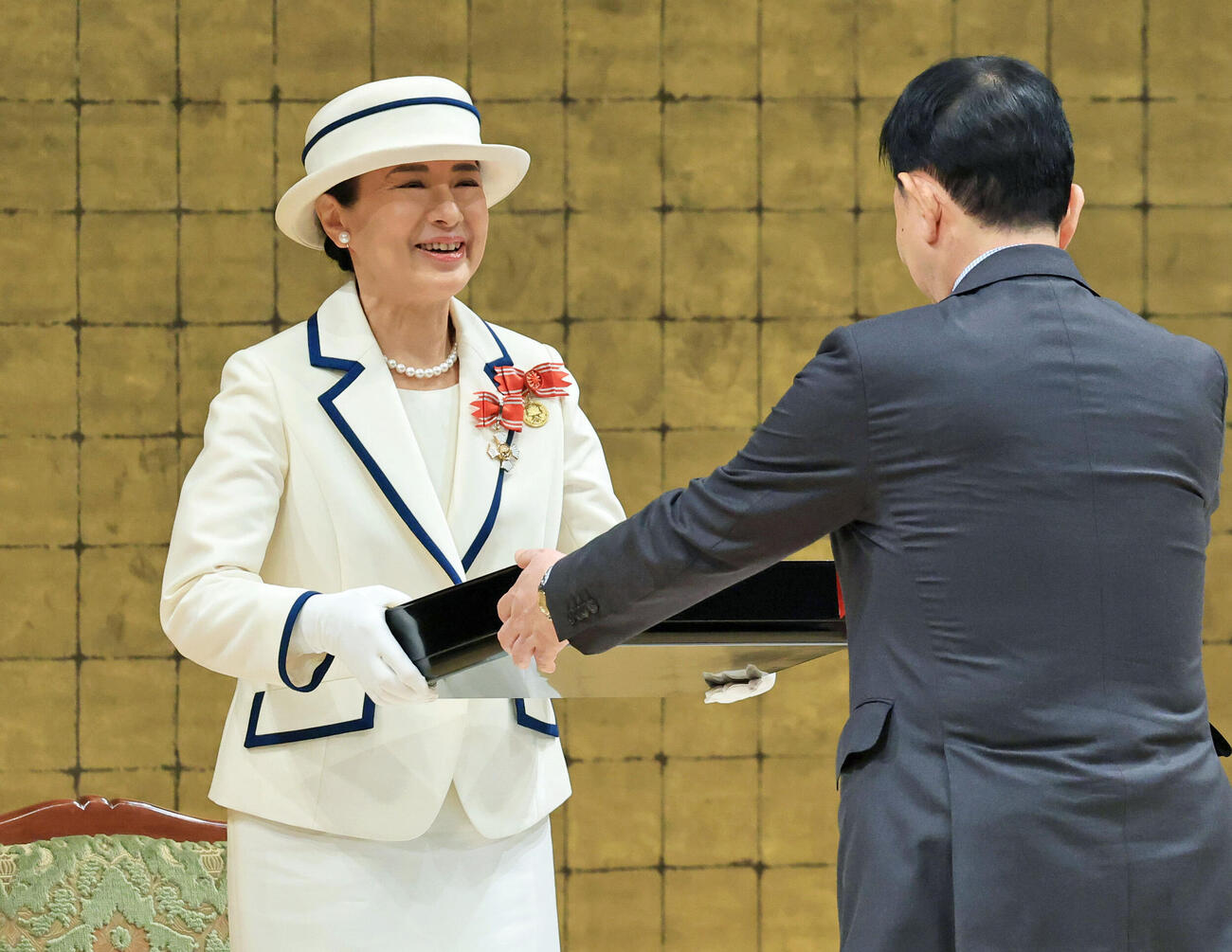 日本赤十字社の全国赤十字大会に出席された皇后さま＝12日午前、東京都渋谷区の明治神宮会館（代表撮影）（共同）