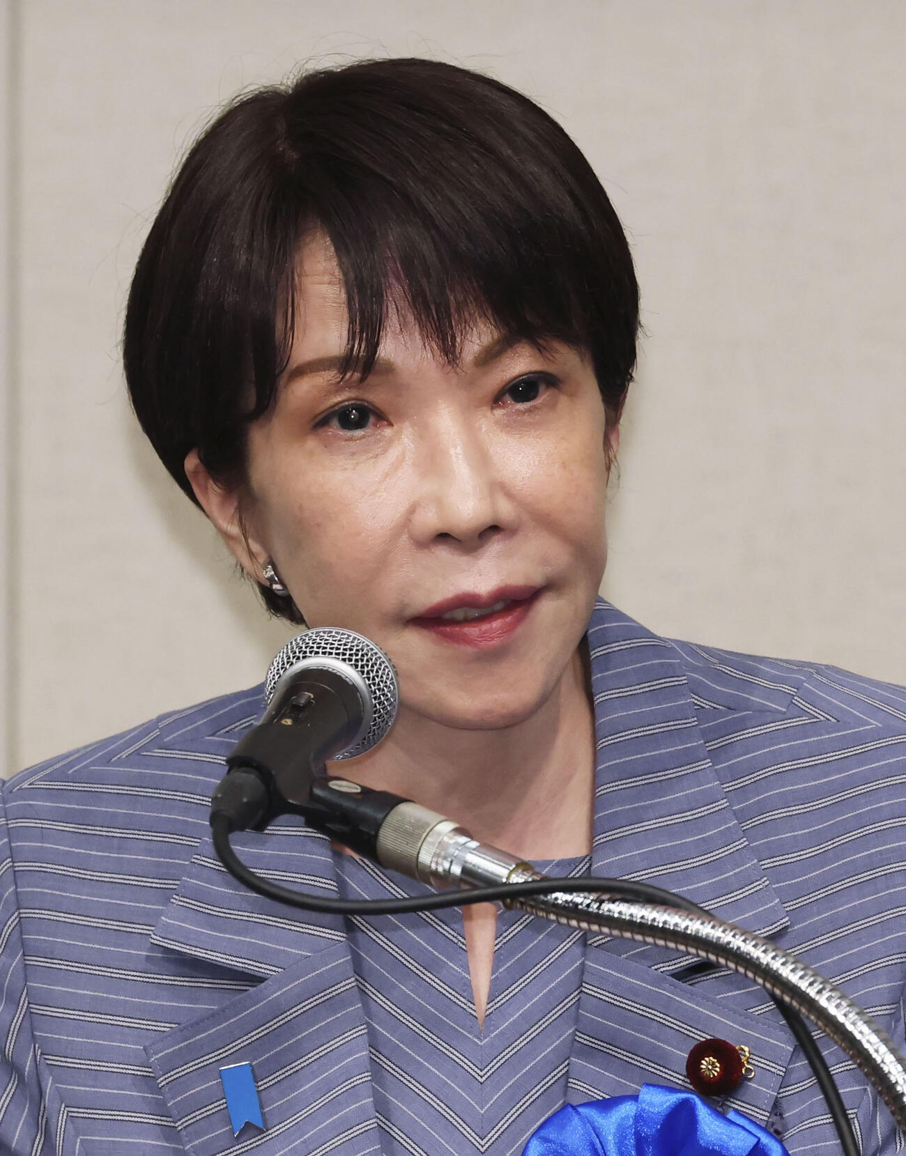 北朝鮮による拉致被害者の帰国を求める「国民大集会」で、あいさつする高市首相＝30日午後、東京都千代田区（共同）