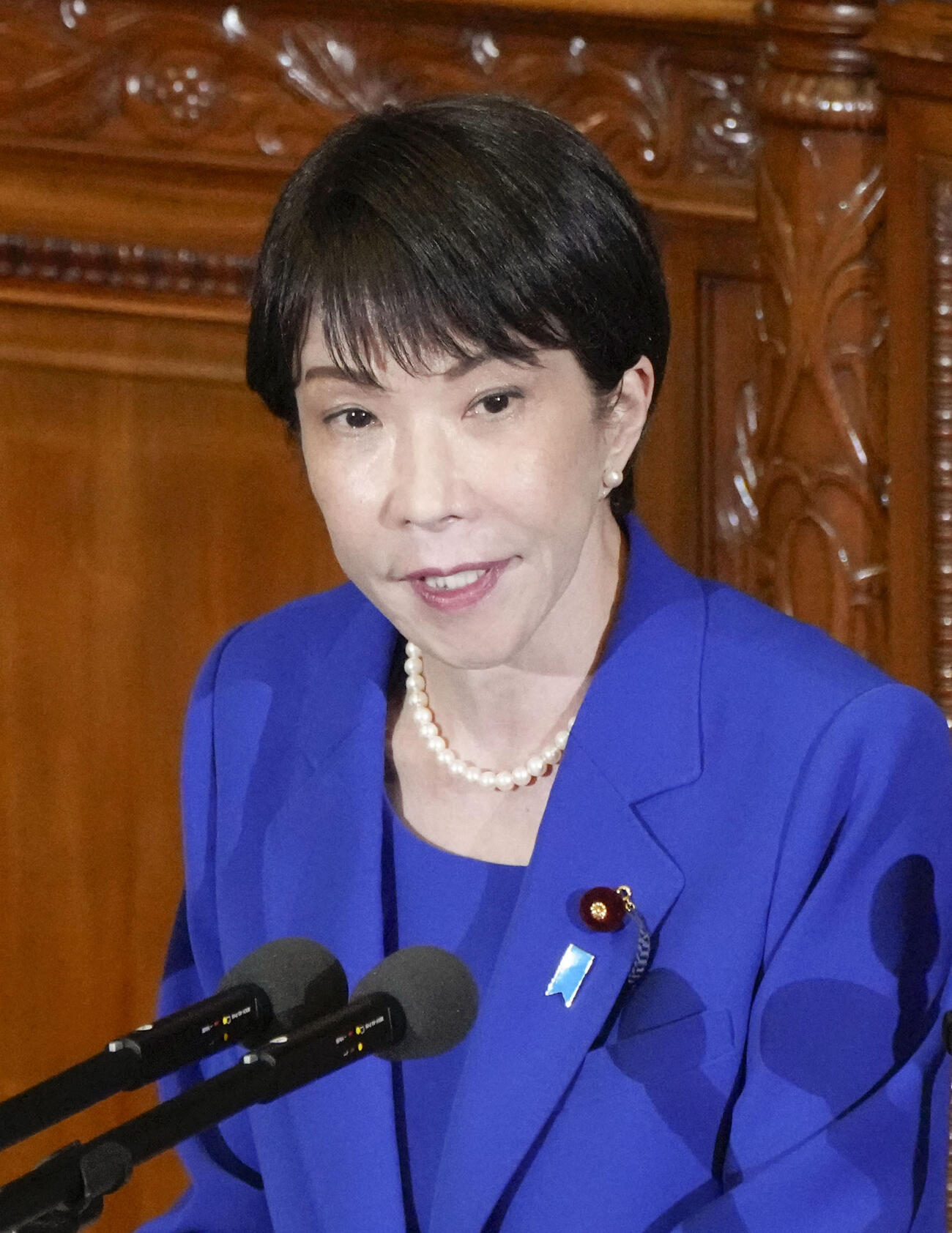 衆院本会議で答弁する高市首相（共同）