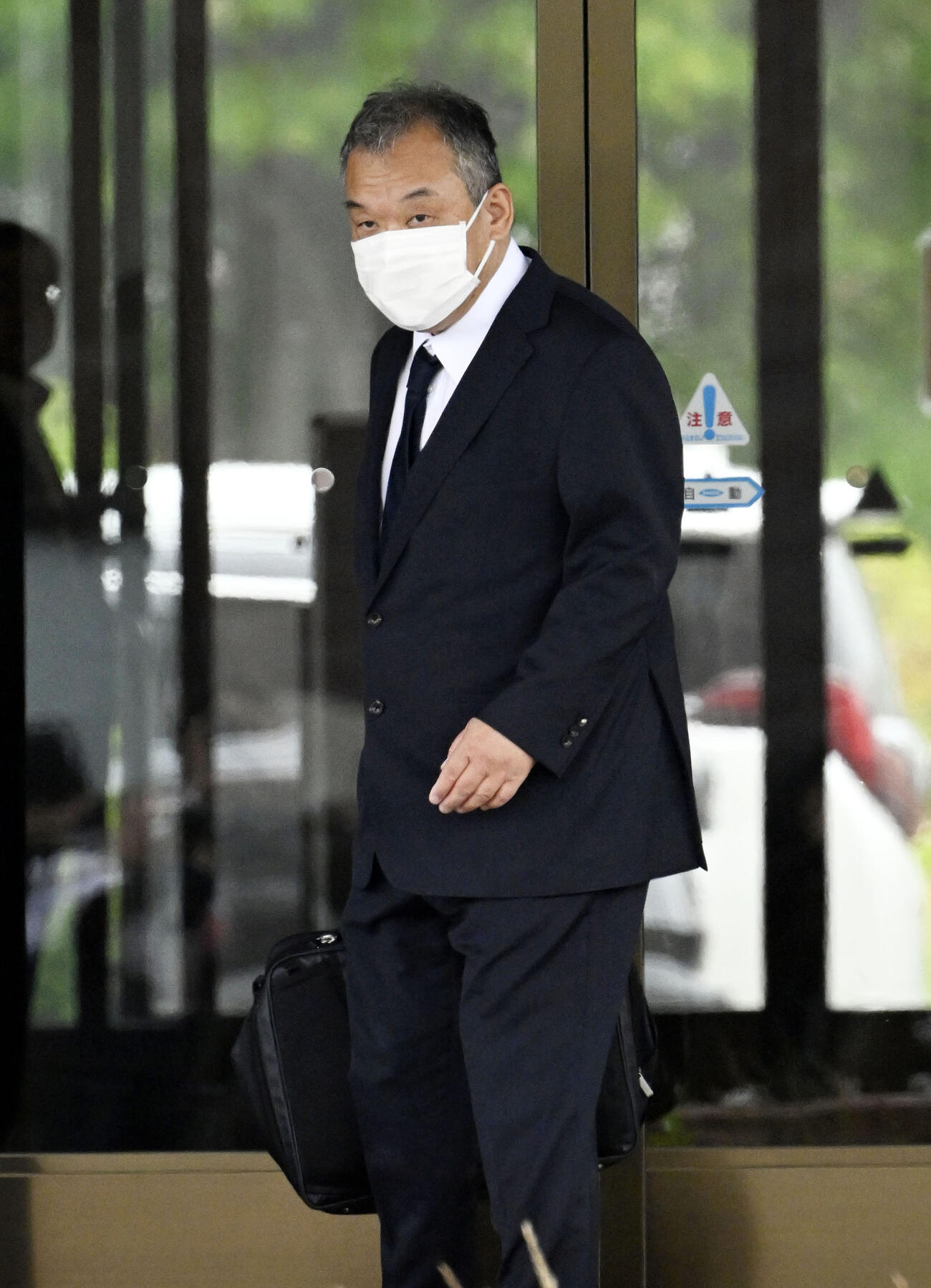 釧路地裁に入る桂田精一被告