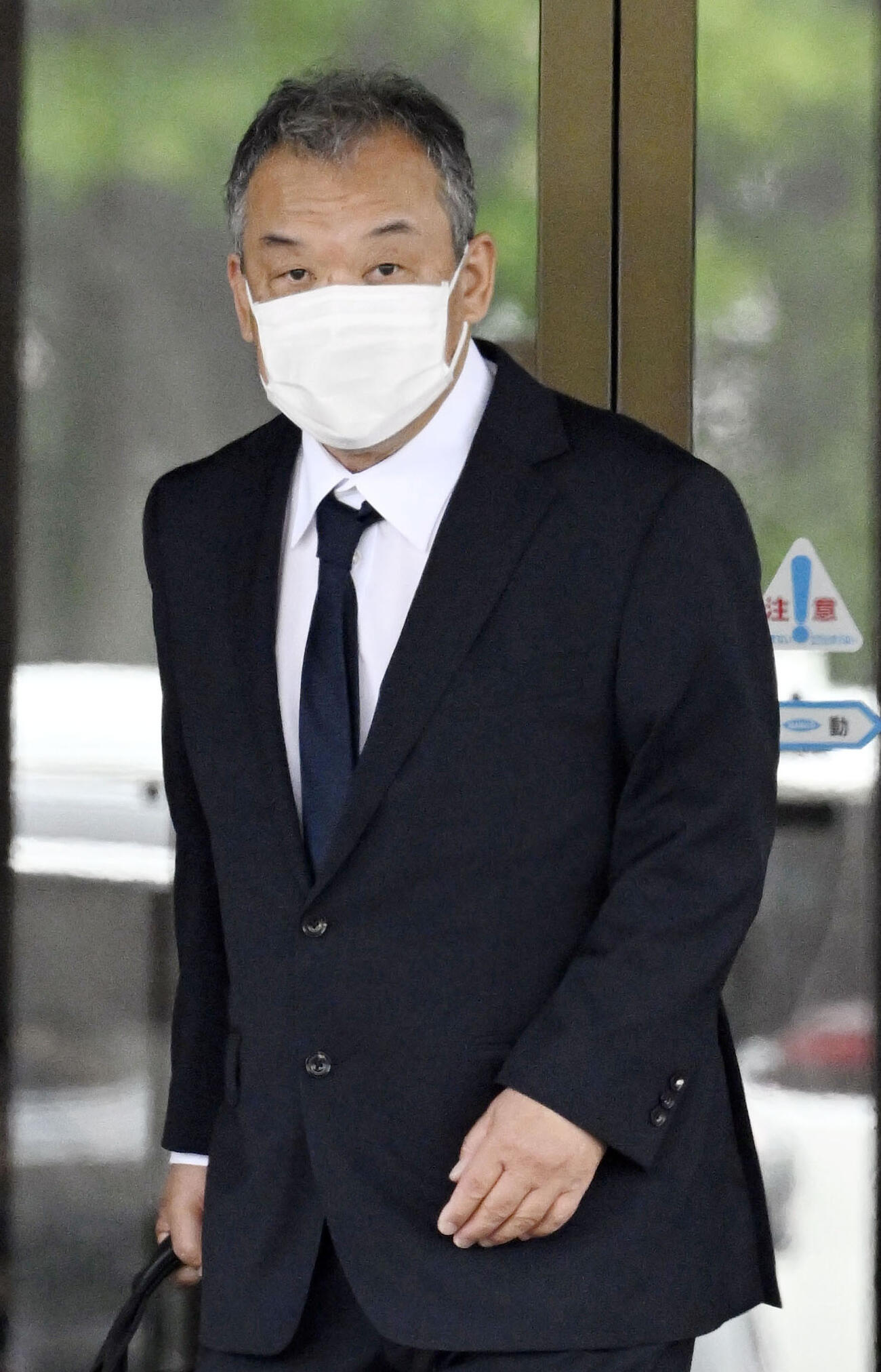 釧路地裁に入る桂田精一被告