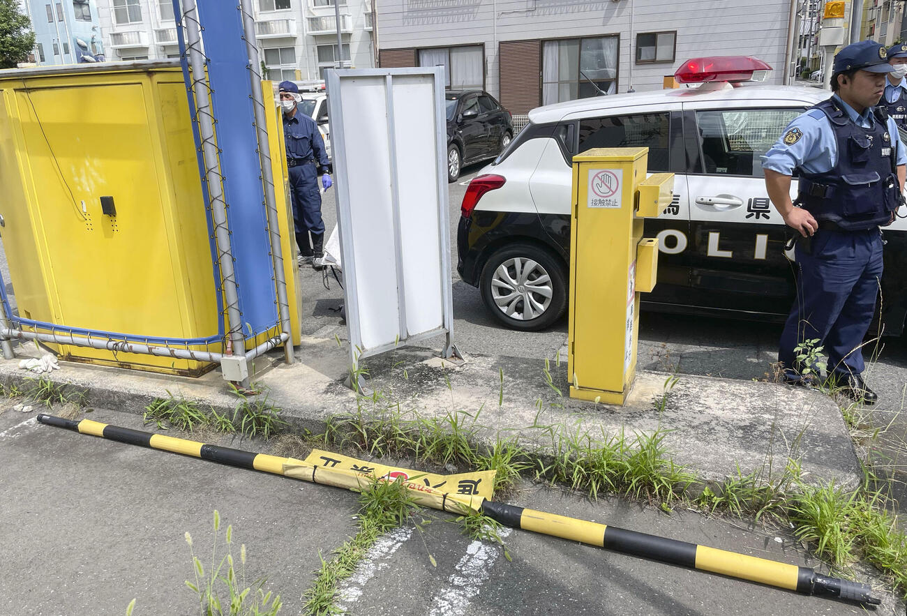破損した駐車場出入り口のバー（共同）