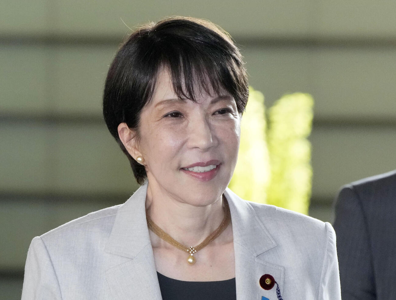 首相官邸に入る高市首相＝21日午前（共同）