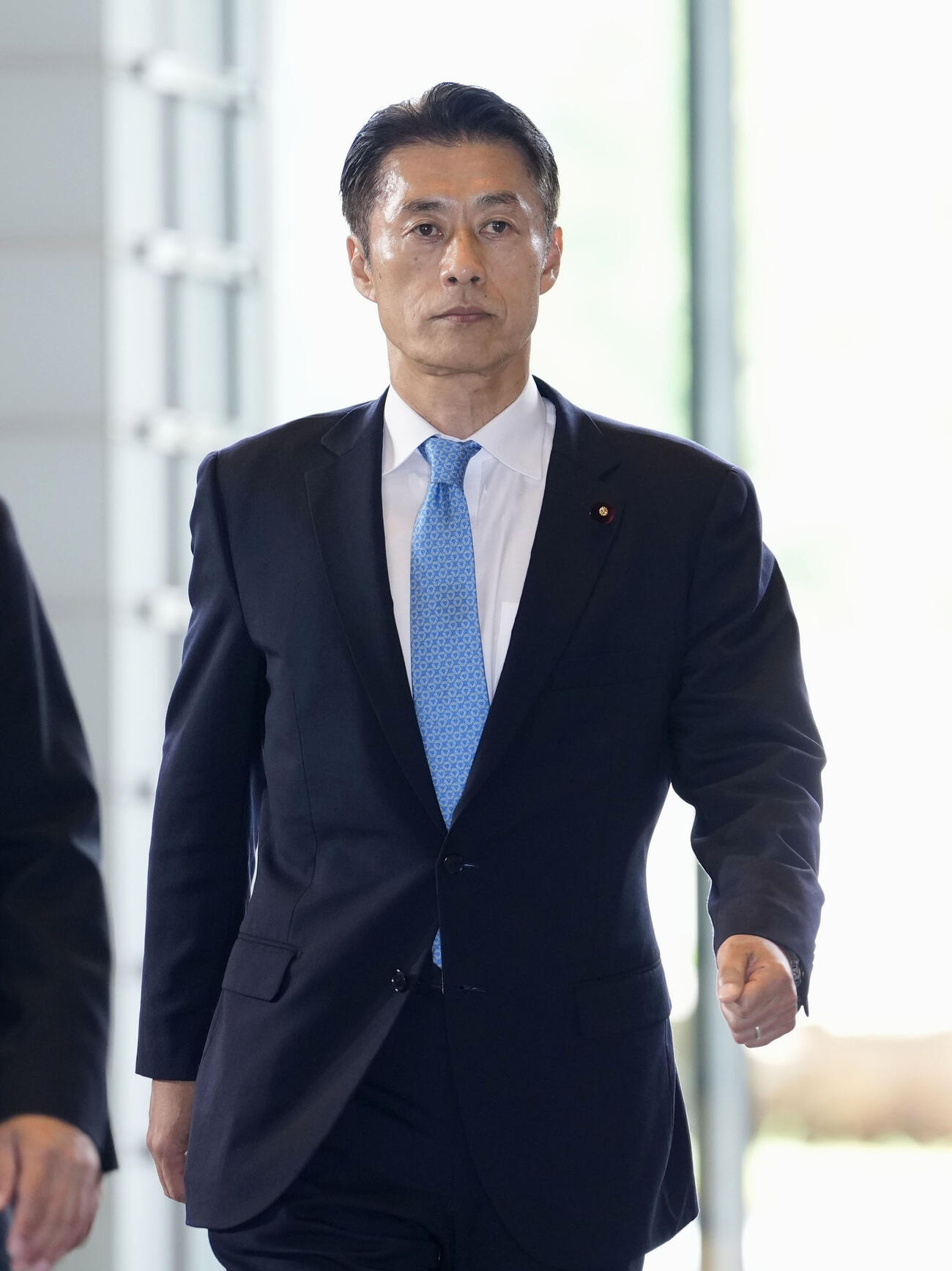 復興相に決まり、首相官邸に入る細野豪志氏＝17日午後1時10分（共同）