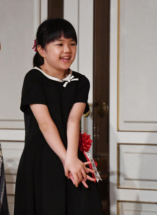 ワールド碁フェスティバルで仲邑菫は対局を終え笑顔を見せる（撮影・奥田泰也）