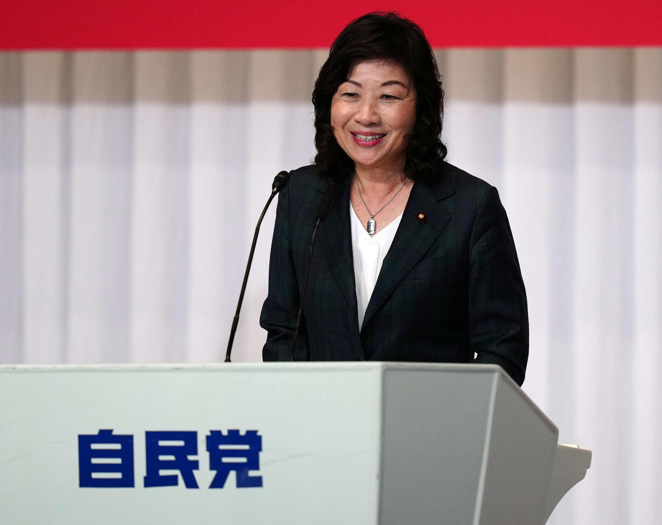 所見発表演説会で笑顔を見せる野田聖子幹事長代行（撮影・江口和貴）