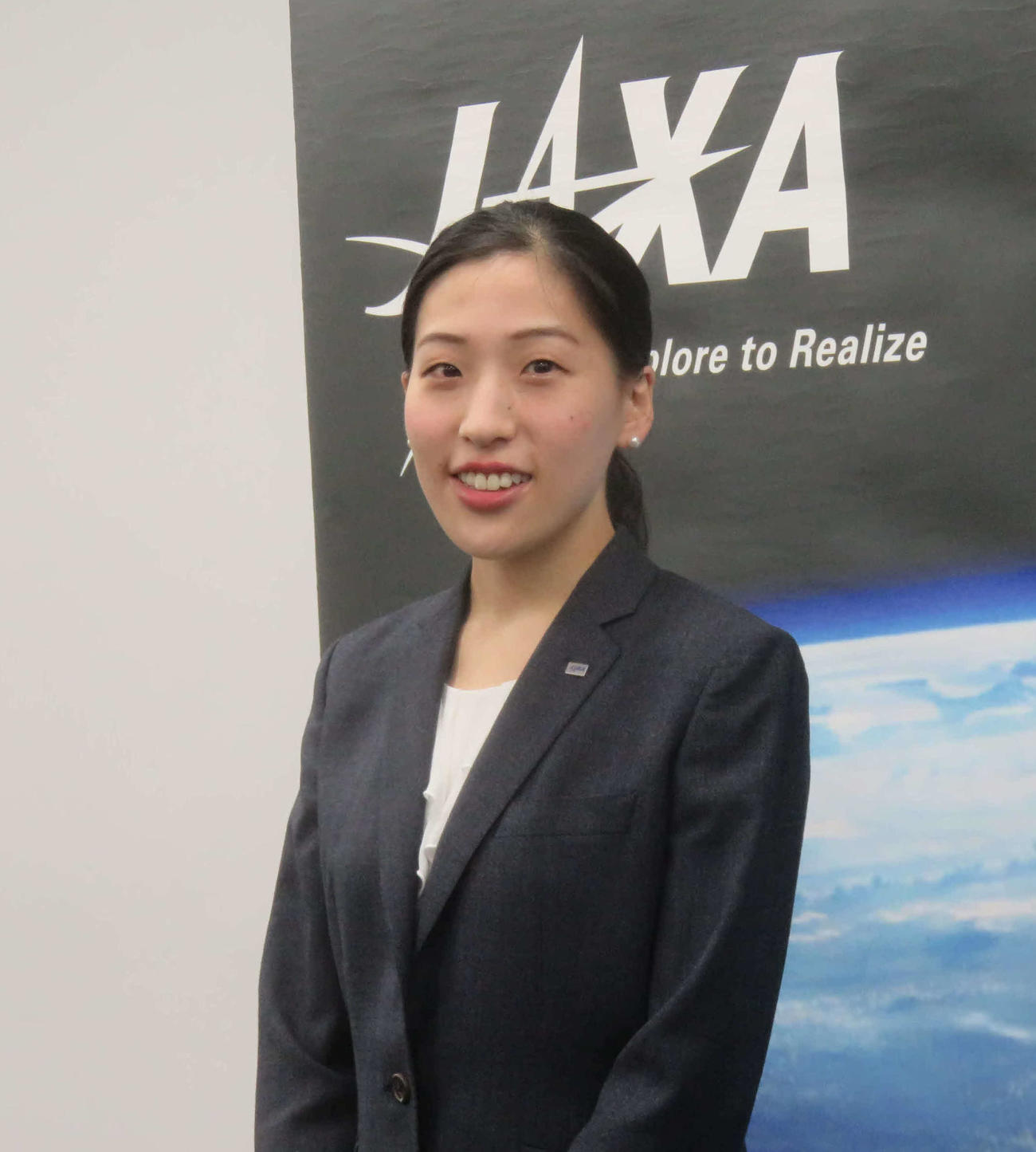 記者会見で月や火星探査への夢を語った米田あゆさん（撮影・大上悟）