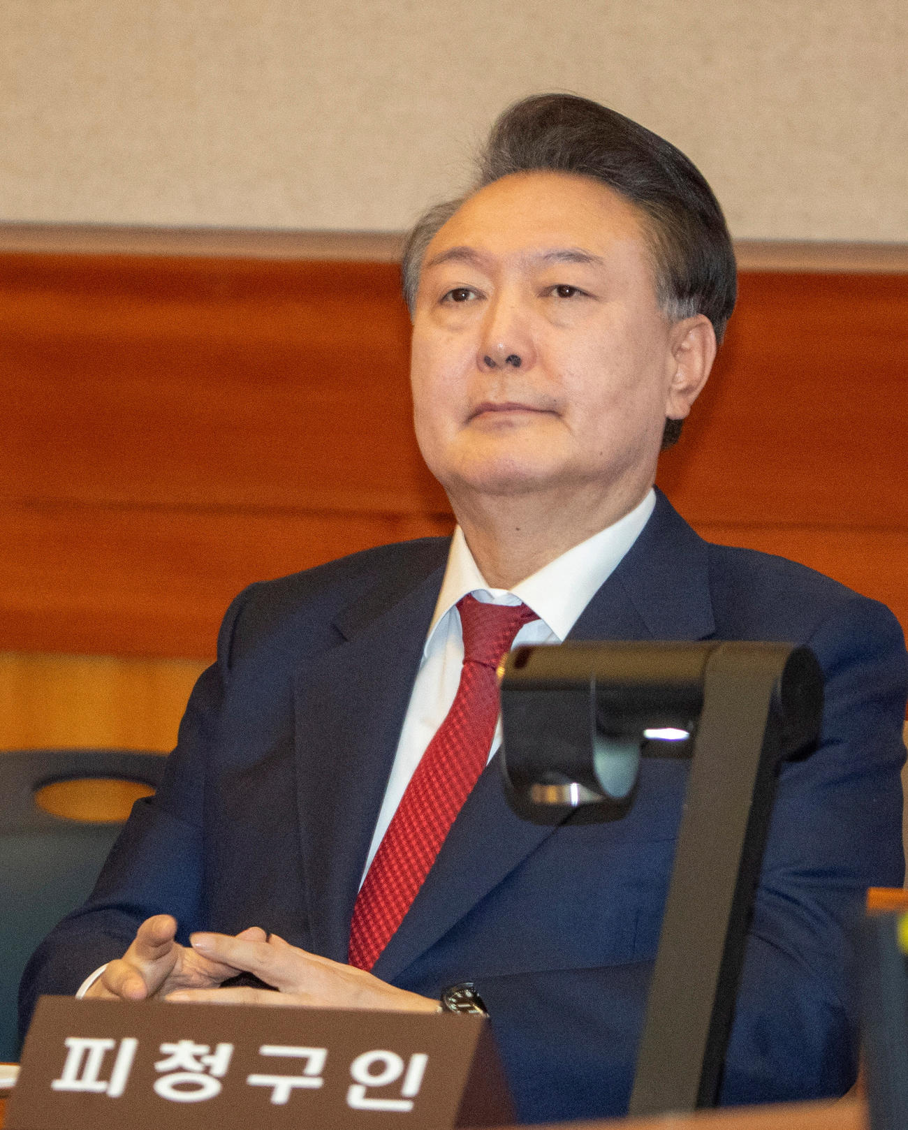 2025年2月20日、韓国・ソウルの憲法裁判所で、弾劾裁判の審理に臨む韓国の尹錫悦大統領（ロイター）
