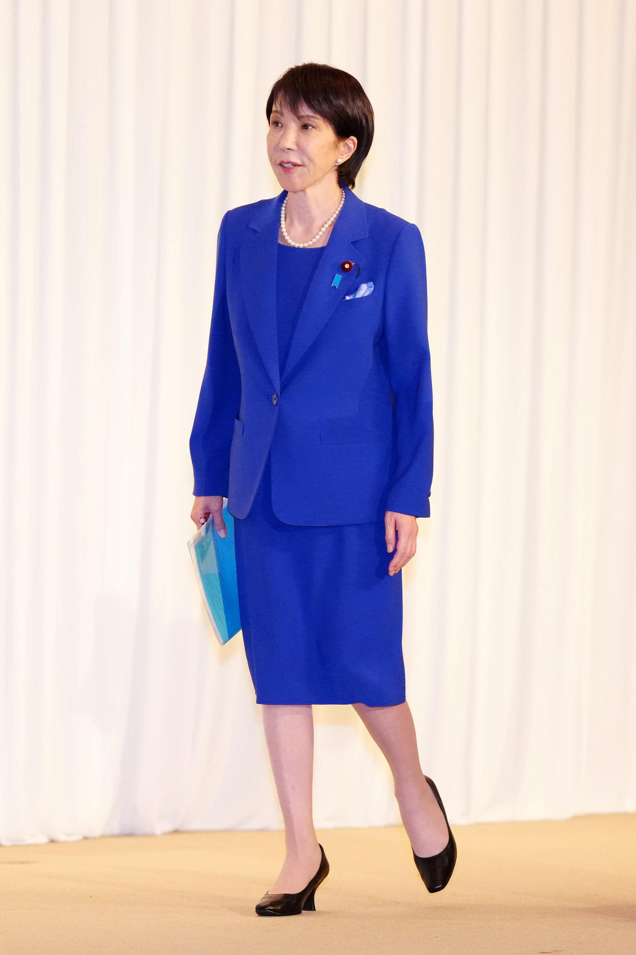 会見を終え、引き揚げる自民党新総裁の高市早苗氏（撮影・江口和貴）