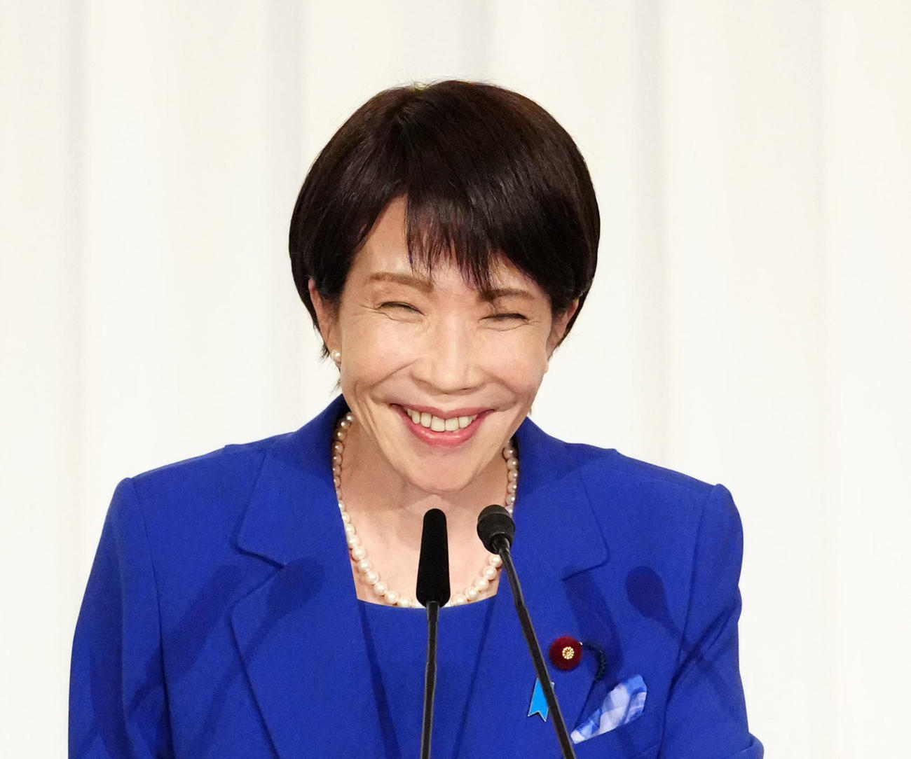 自民党新総裁となり会見で笑顔を見せる高市早苗氏（2025年10月4日撮影）