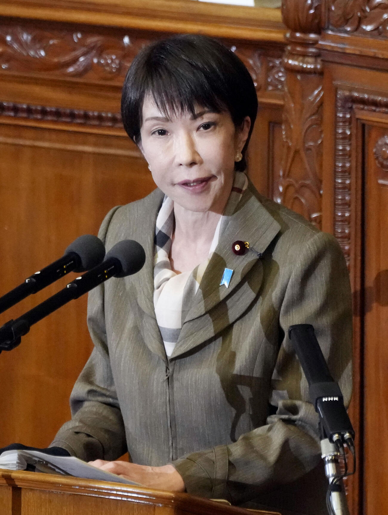 衆院本会議で、中道改革連合の小川代表の代表質問に答弁する高市首相（共同）