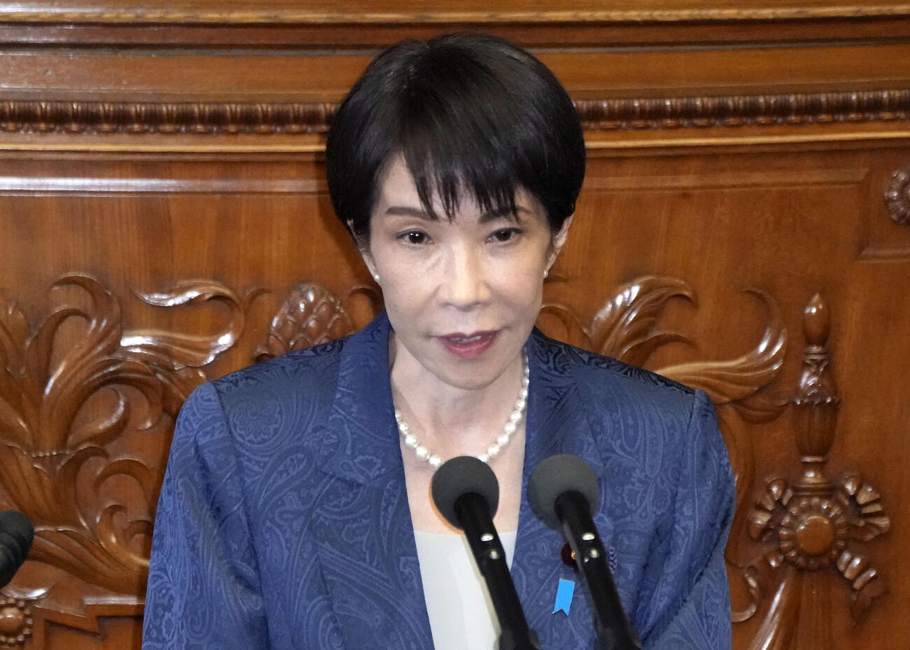 衆院本会議で訪米について報告する高市首相(共同)